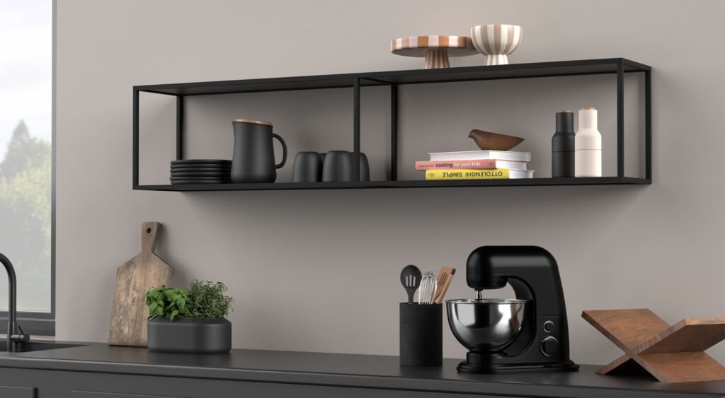 Minimalist metal floating shelves in a modern kitchen, holding pots, pans, and utensils.